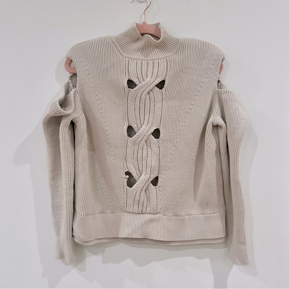Jonathan Simkhai beige sweater with cold-shoulder cutouts and shoulder pads